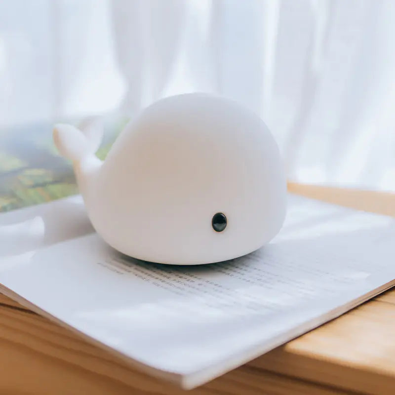 Transform your space into a whimsical wonderland. This creative USB night light is not just a source of illumination but a delightful decor piece that adds charm to any room. Perfect for children's bedrooms, nurseries, or as a unique gift, this adorable dolphin-shaped lamp will captivate hearts and spark joy.