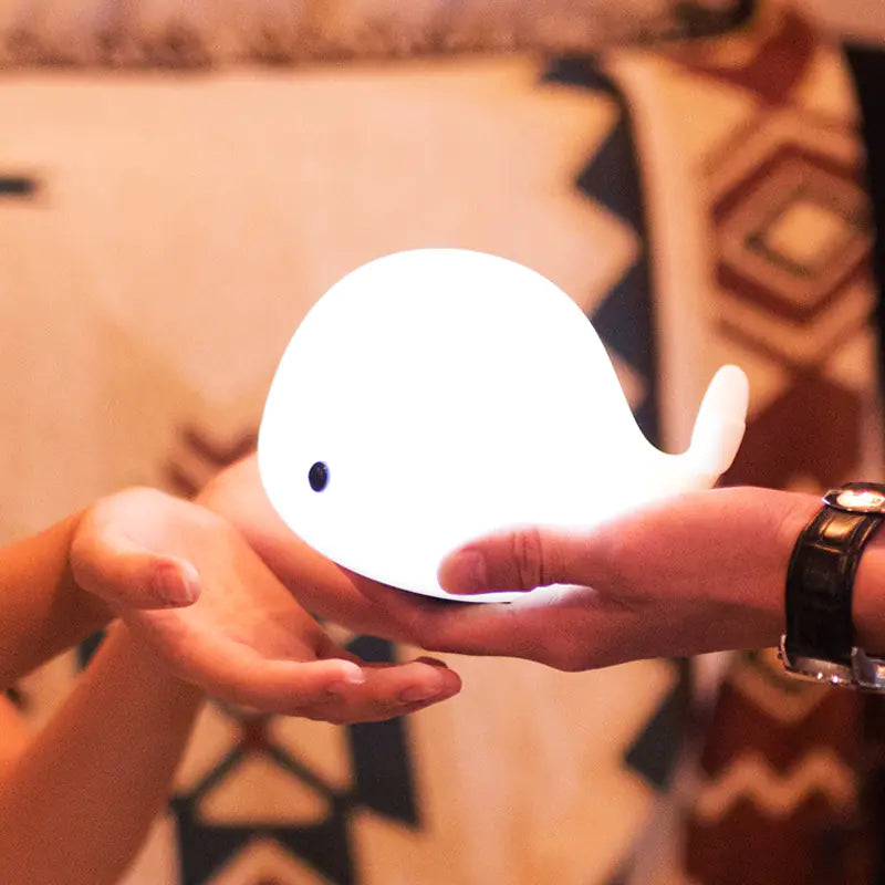 Transform your space into a whimsical wonderland. This creative USB night light is not just a source of illumination but a delightful decor piece that adds charm to any room. Perfect for children's bedrooms, nurseries, or as a unique gift, this adorable dolphin-shaped lamp will captivate hearts and spark joy.
