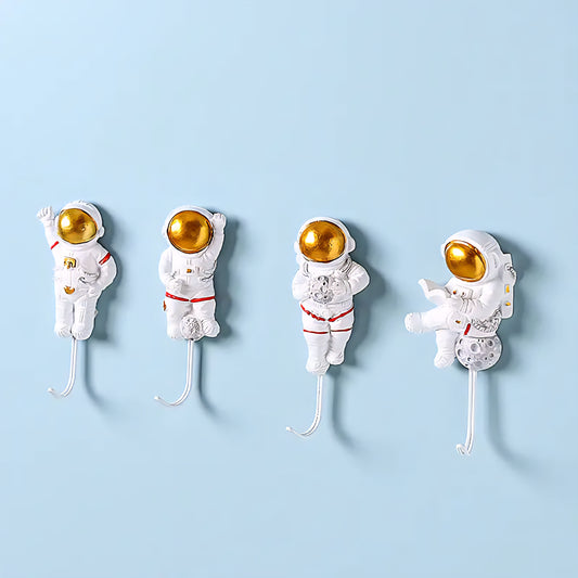 This charming wall hook, designed in the shape of a cartoon astronaut, will not only keep your items organized but also add a whimsical touch to your home decor. Canada