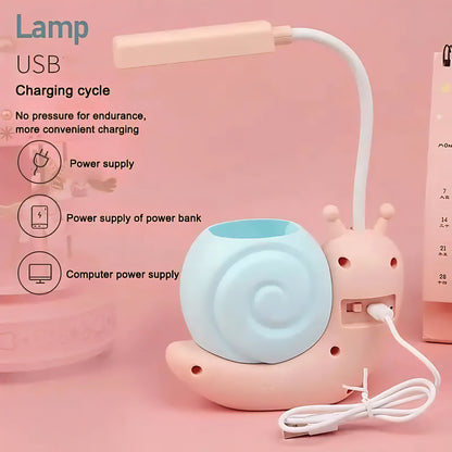 Brighten up your workspace with this adorable Cute Snail USB Charging Desk Lamp, designed to add a touch of whimsy and practicality to your desk. With its modern and simple style, this lamp serves not just as a light source but also as a charming pen holder, making it perfect for organizing your stationery while you work or study